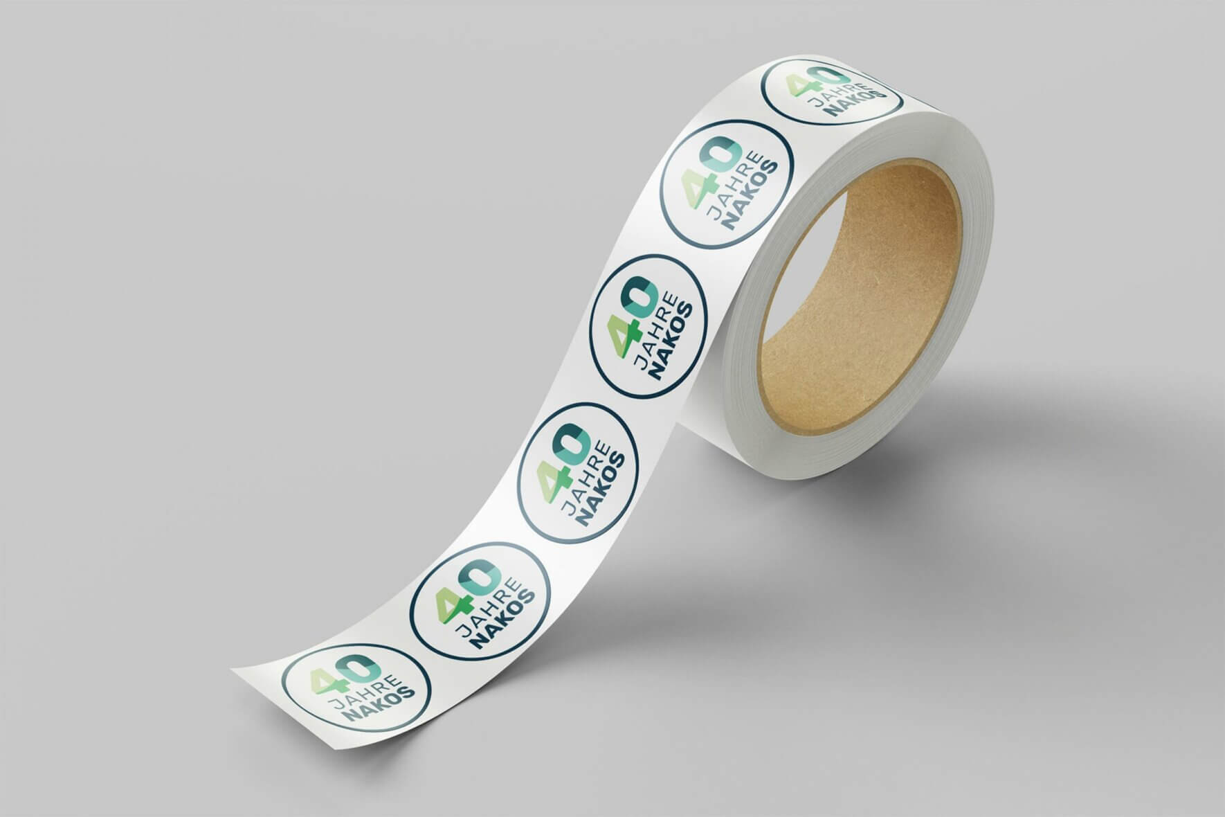 2024-09-18-NAKOS-40-Jahre-Sticker-Mockup-001 2024-09-18-NAKOS-40-Jahre-Sticker-Mockup-001
